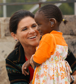 Tani Austin and girl wearing hearing aids
